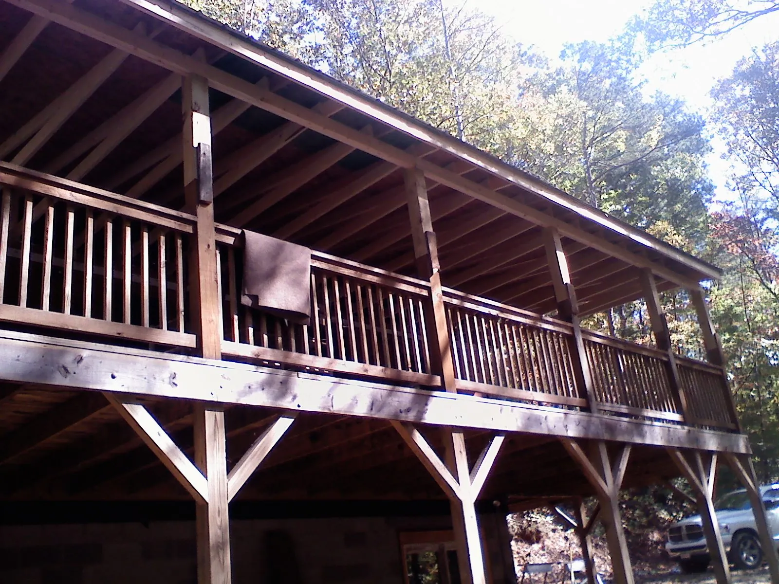 Timber framing under a new elevated porch and deck — Roof Leak Repair in South Solon by Roofing Brothers
